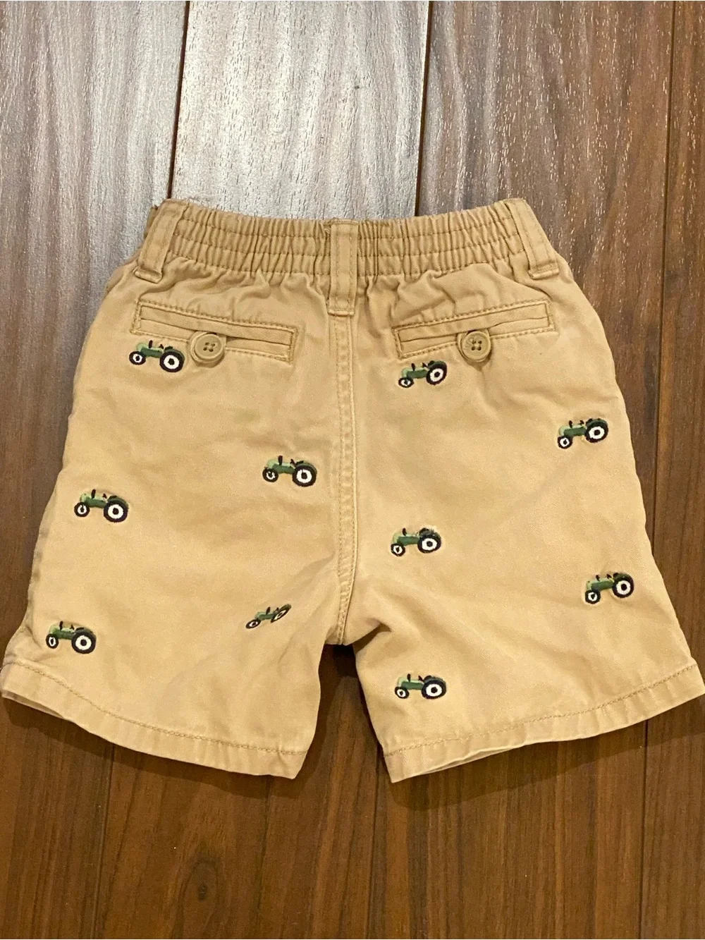 Gymboree khaki shorts with green embroidered tractors size 12-18 mos